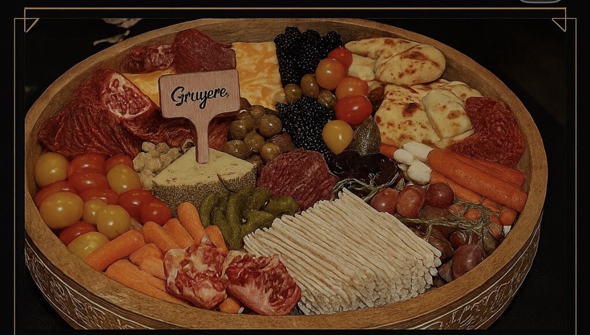 A real Urban Drinkery charcuterie board with meats, cheeses, fruit, vegetables and crackers